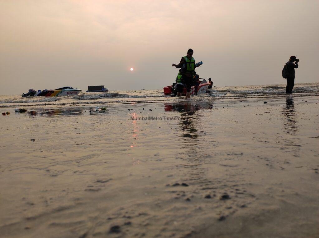 Sun setting over the Arabian Sea at Juhu Beach