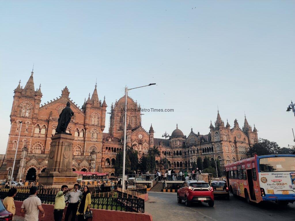 The front of Chhatrapati Shivaji Maharaj Terminus seen from the junction in the evening