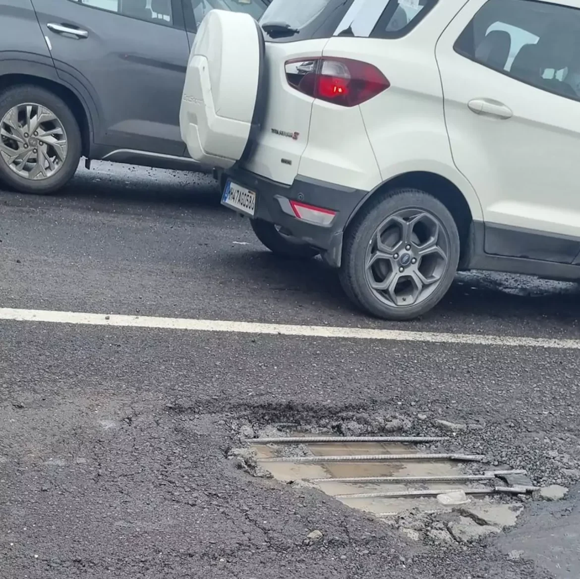 Versova Creek Bridge potholes